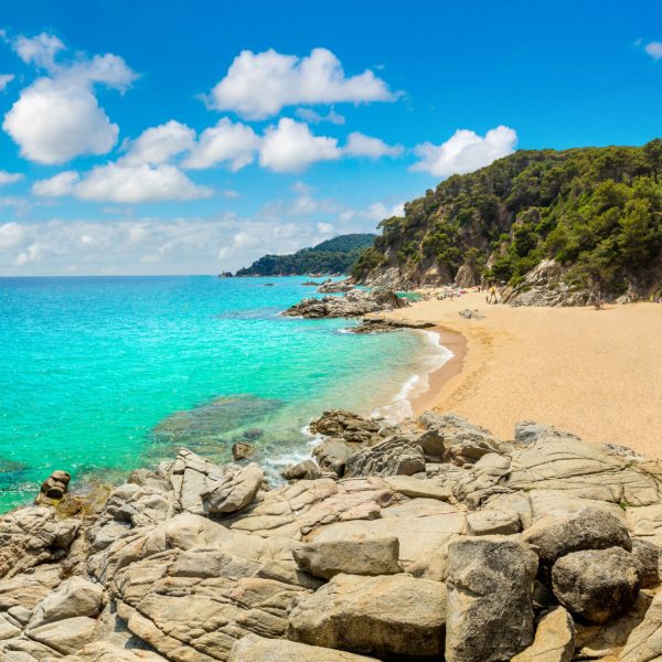 Panorama of Rocks on the coast of Lloret de Mar in a beautiful summer day, Costa Brava,  Catalonia, Spain
